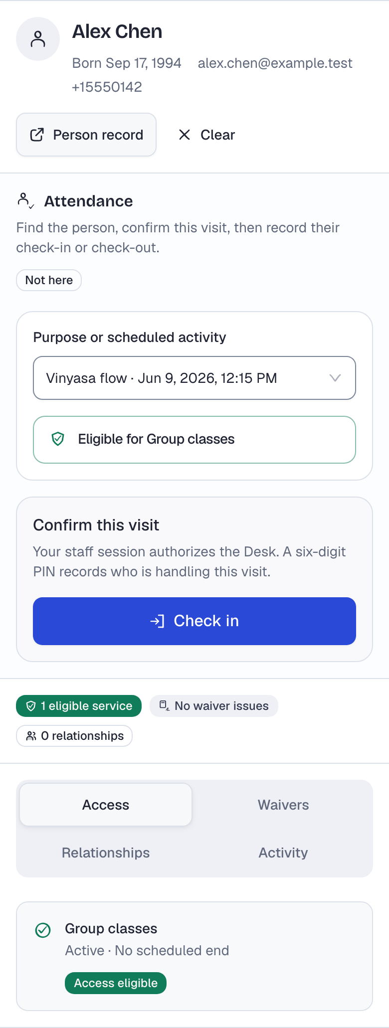 Alex Chen's record at the Desk after the payment, with a Vinyasa flow class selected. The attendance panel reads Eligible for Group classes and offers Check in.